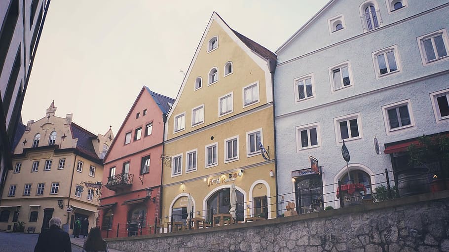 building near slope road with people walking during daytime, architecture HD wallpaper