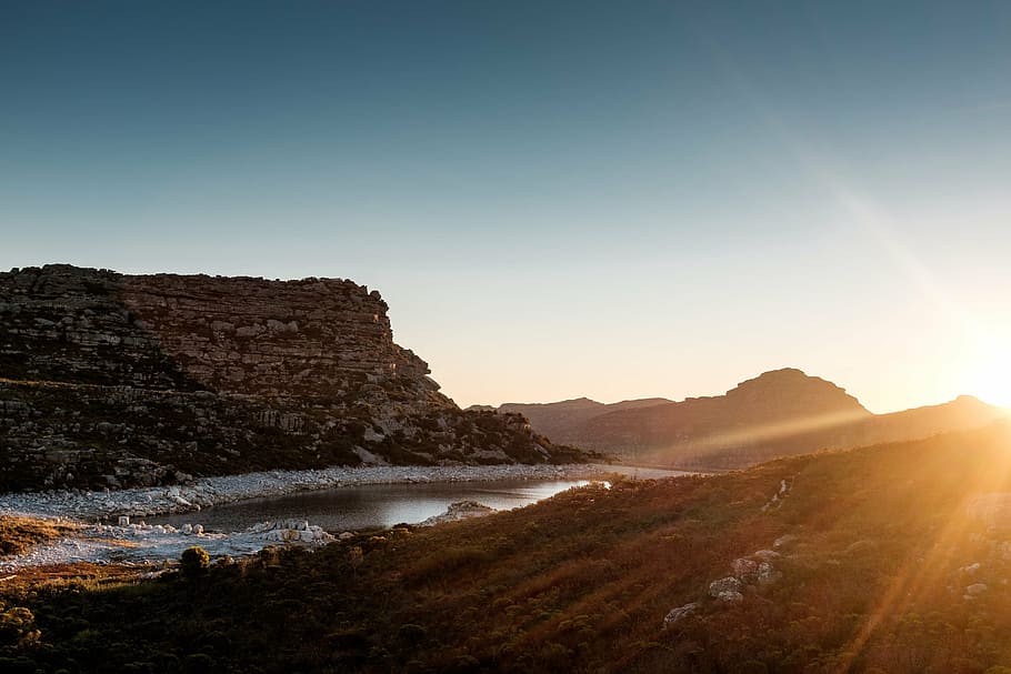 brown mountain near body of water at daytime, rough, road, sunset HD wallpaper
