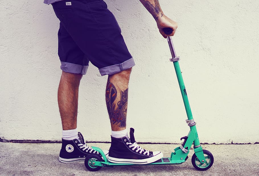person rides on teal kick scooter, man, guy, tattoos, tattooed HD wallpaper