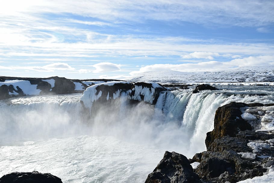 waterfalls on black rocky mountains during winter, iceland HD wallpaper