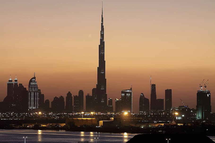 city skyline during sunset, night, dubai, skyscraper, building exterior HD wallpaper
