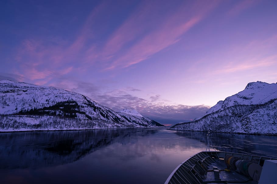 landscape photo of snow covering mountain, view of boat in middle of body of water surrounded with snowy mountains HD wallpaper