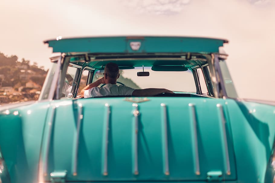 man inside blue vintage vehicle, car, classic, driver, person HD wallpaper