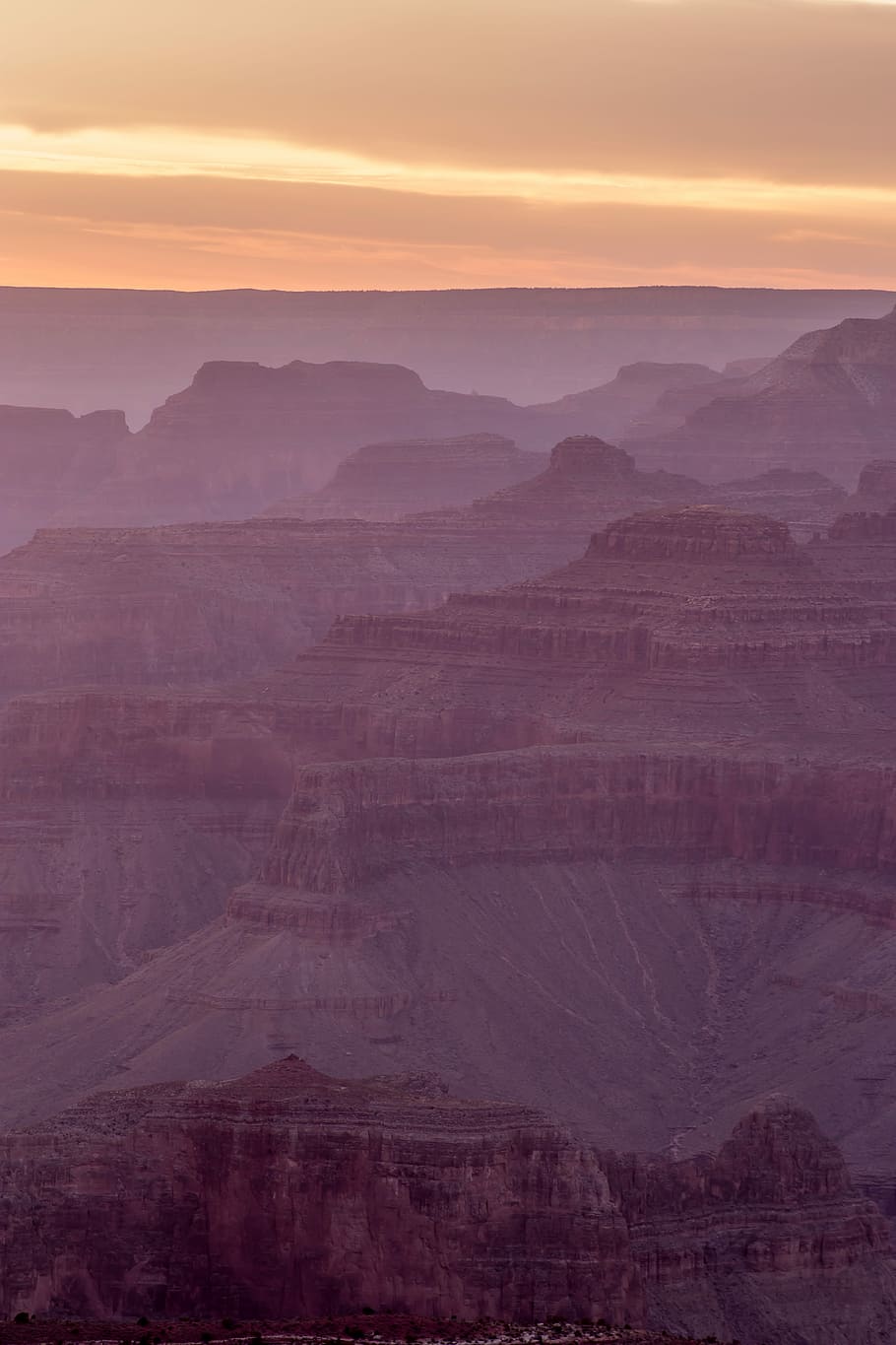 brown mountains under sunset, aerial photography of rock formations during golden hour HD wallpaper
