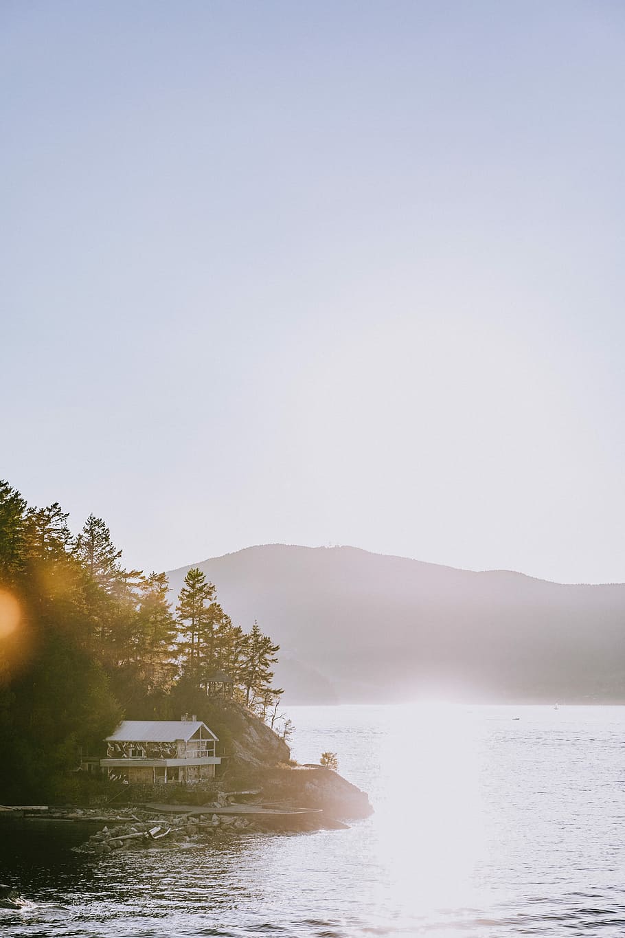 white cabin near body of water, white wooden house near trees and body of water HD wallpaper
