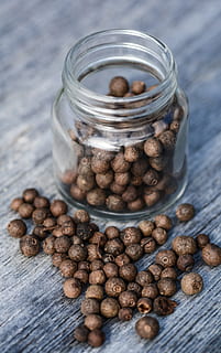 brown seeds inside clear glass jar on gray plank, spices, kitchen HD wallpaper