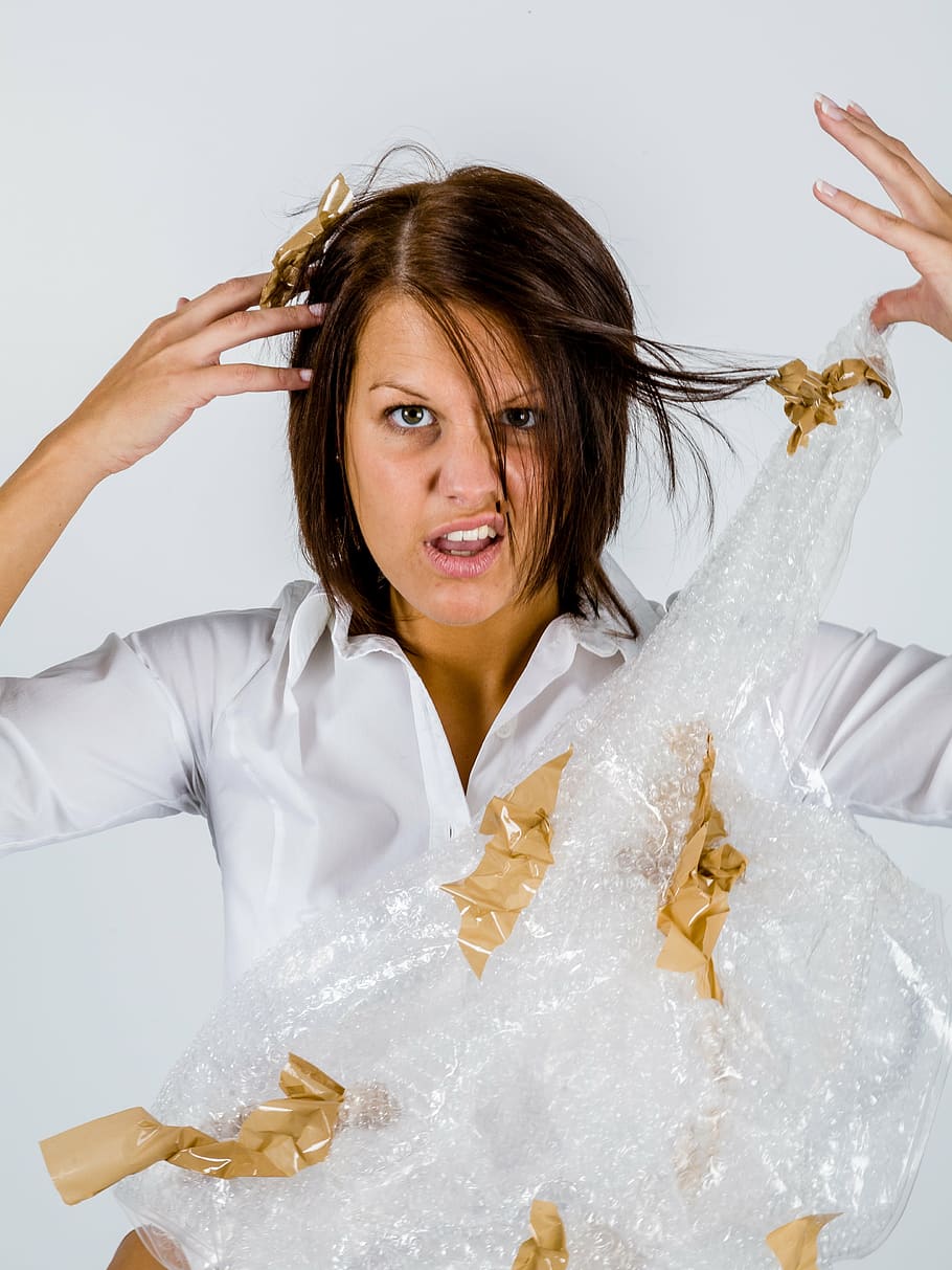 woman in white top holding bubble wrap, office, packaging, tape, HD wallpaper