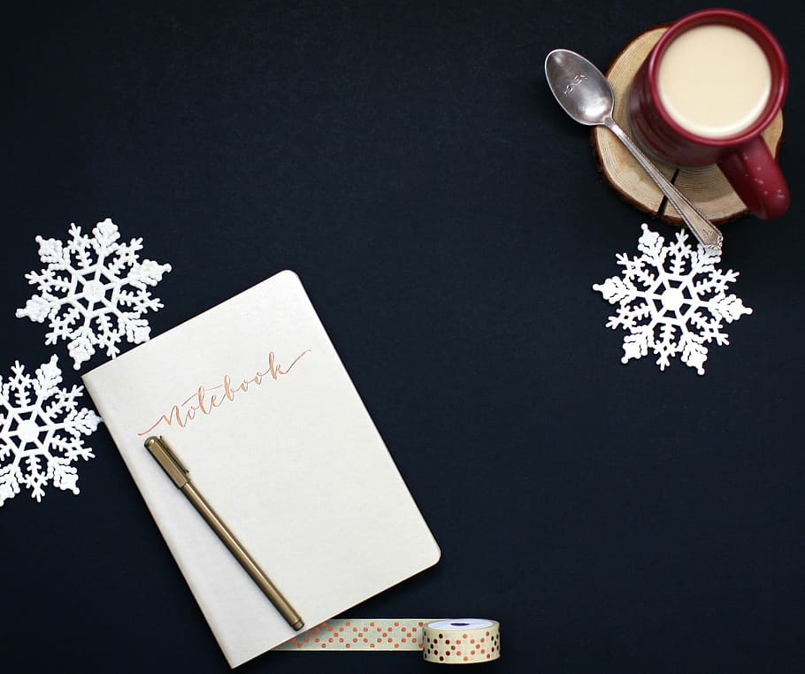 notebook with gold-colored pen beside red mug with liquid, winter, HD wallpaper