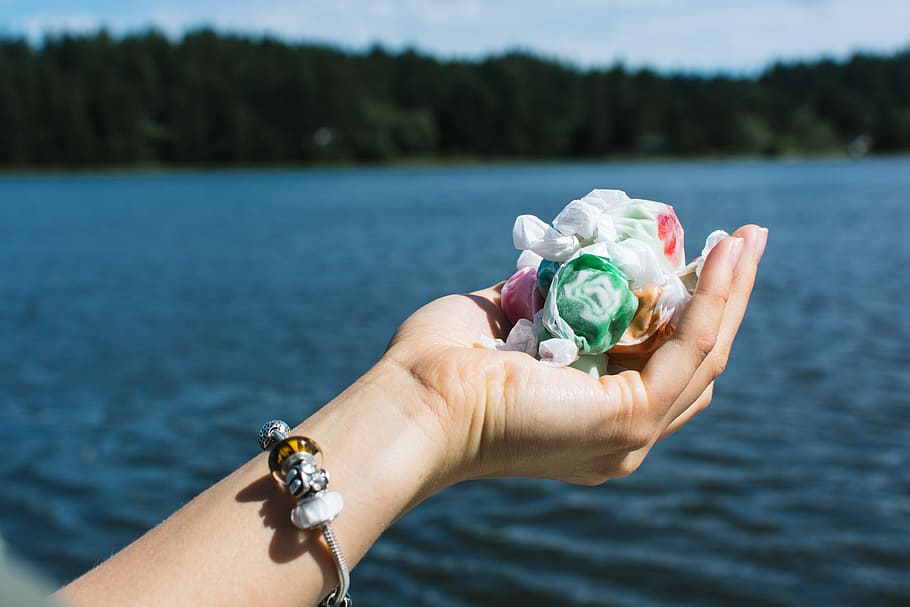 Salt Water Taffy sweets, colorful, hands, nature, human Hand HD wallpaper