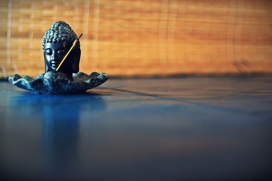close-up photography of buddha black ceramic figurine on black surface, HD wallpaper