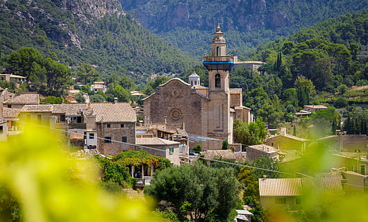 beige concrete building beside mountain, valdemossa, mallorca HD wallpaper