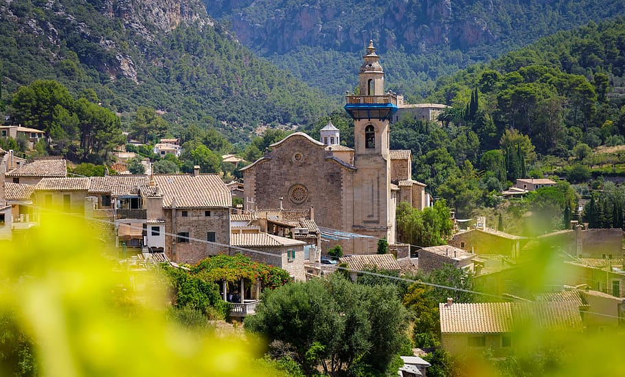 beige concrete building beside mountain, valdemossa, mallorca HD wallpaper