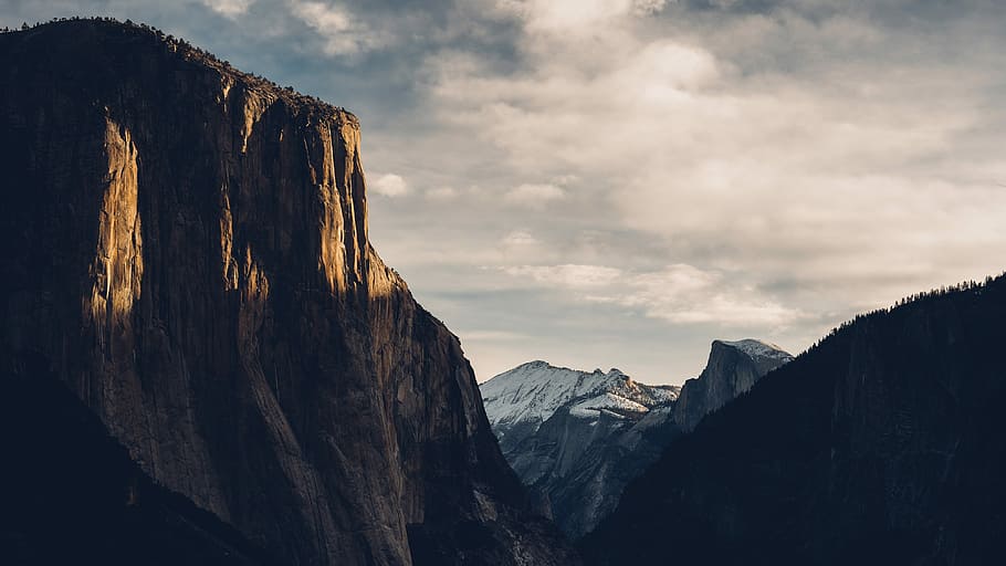 brown rocky mountain, landscape photo of brown rock mountains at daytime HD wallpaper