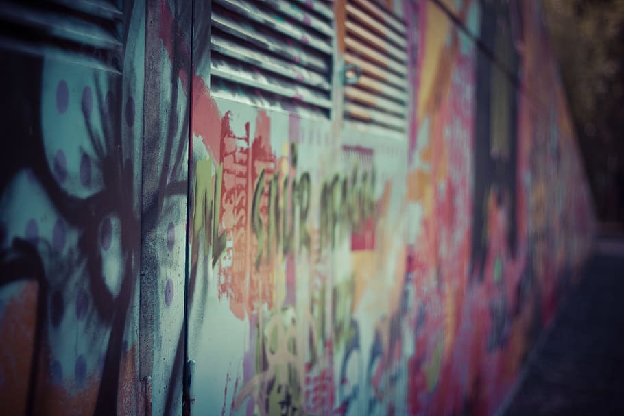 selective focus photography of multicolored graffiti, spray paint HD wallpaper