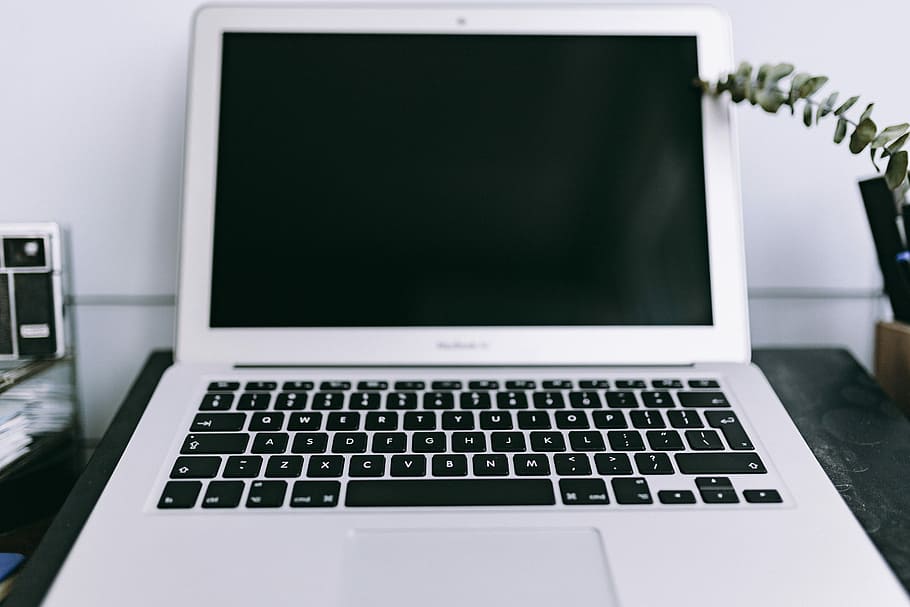 Elegant workspace with Macbook, iPhone, business cards and notebooks HD wallpaper