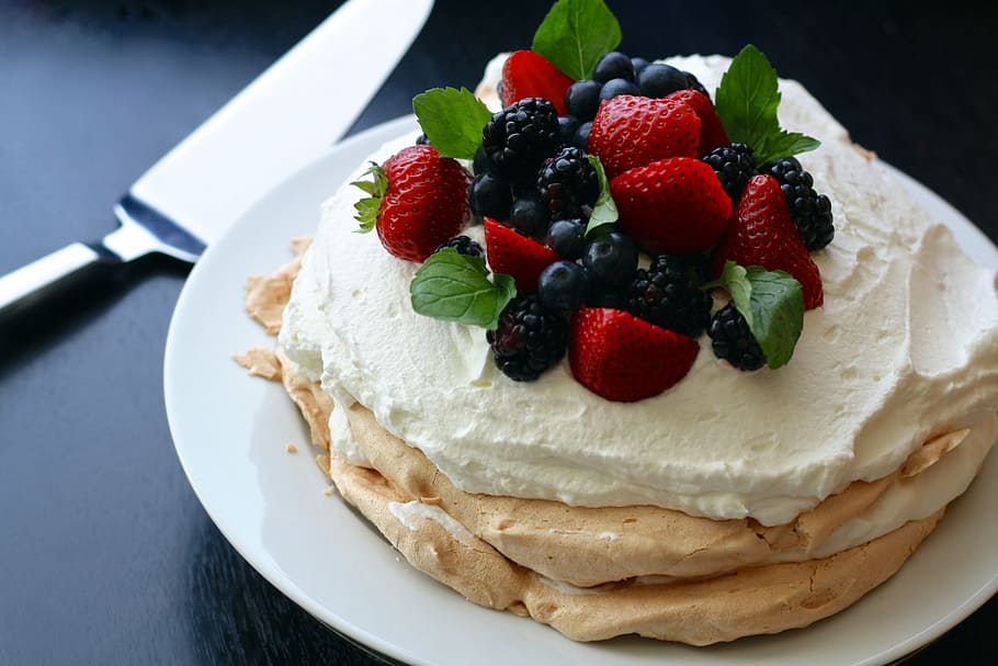 strawberry cake on white plate near stainless steel cake server HD wallpaper
