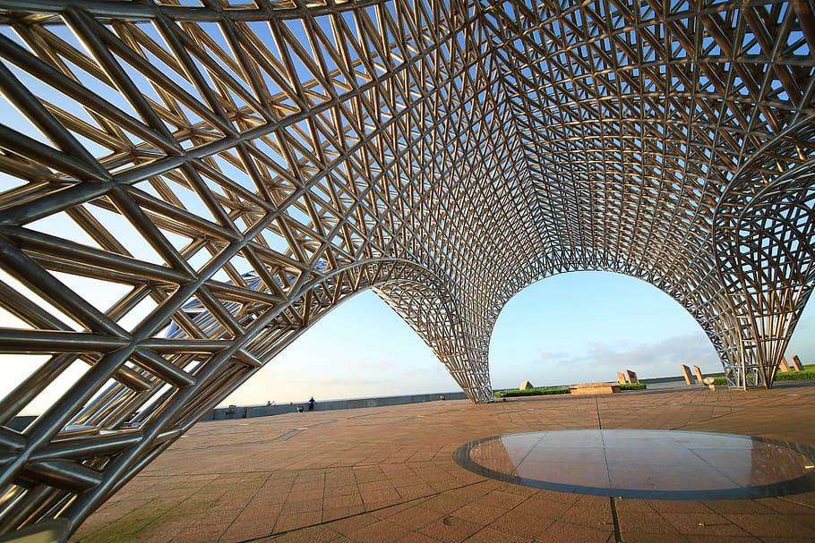 gray steel arch, building, grid, metal, beach, sea view park HD wallpaper