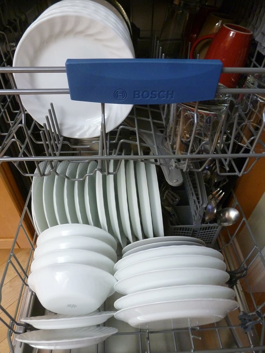 gray Bosch dishwasher filled with plates, interior, dishes, kitchen