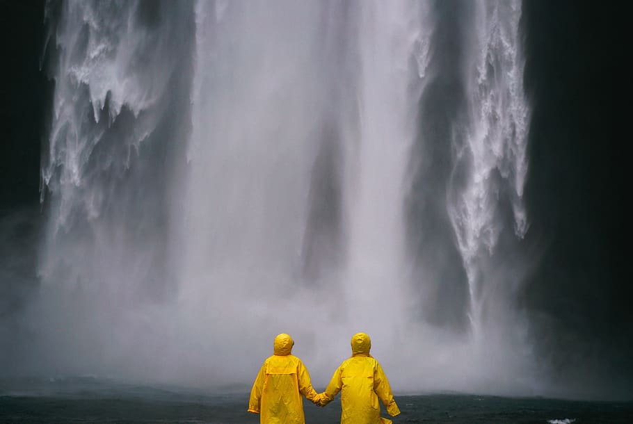 two person wearing yellow raincoats in front of waterfall, couple, HD wallpaper