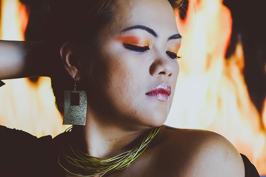 Fire, closeup photo of a woman behind fire, make up, model, portrait HD wallpaper