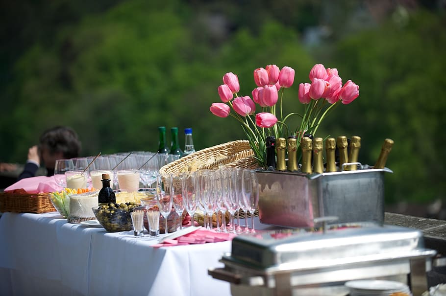 pink tulip flower arrangement beside wine glass and bottle on table, HD wallpaper