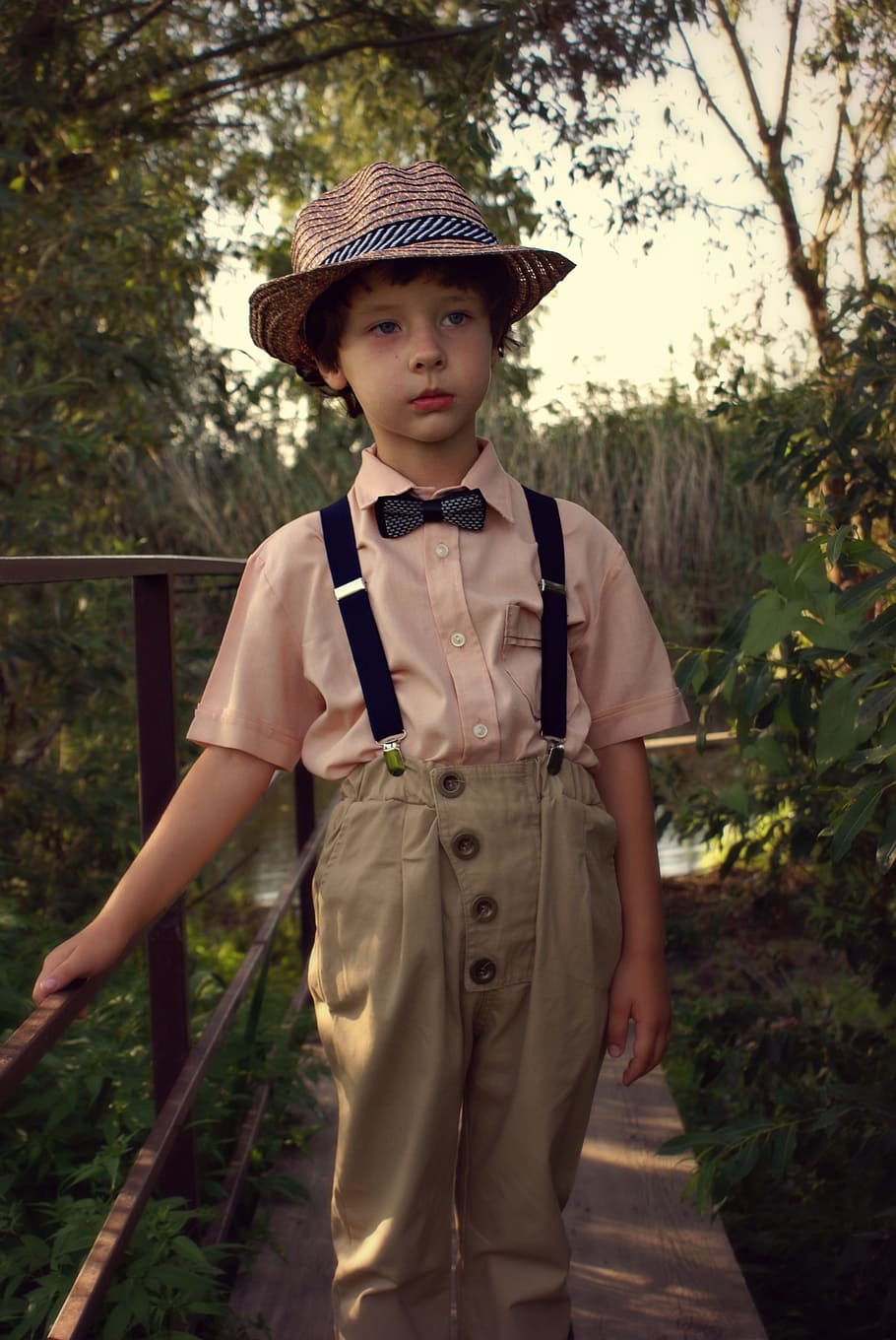 boy standing beside metal fence, summer, costume, hat, baby HD wallpaper