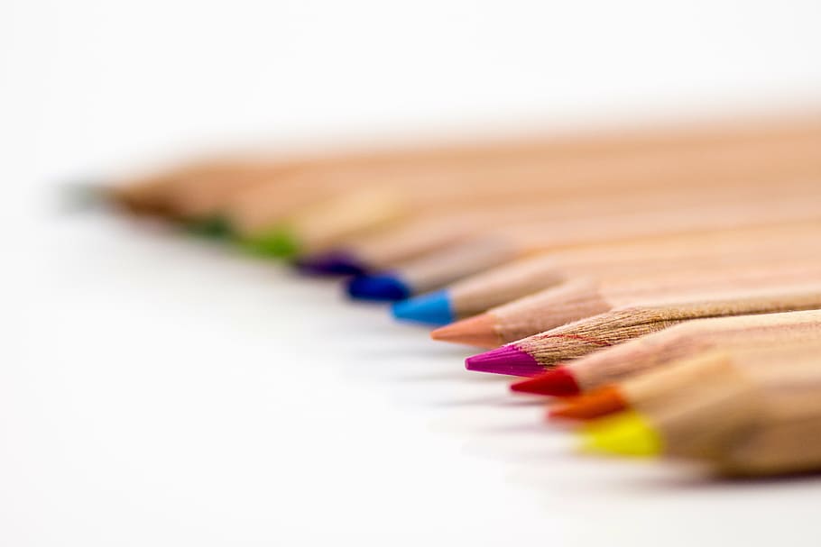 selective focus photography of coloring pencils, colored pencils