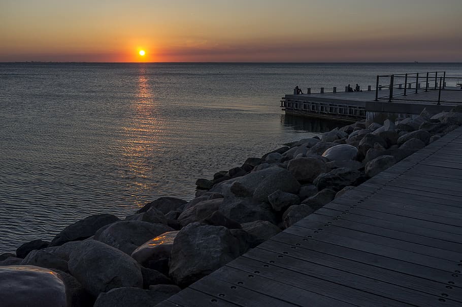 beach, dawn, dock, dusk, horizon, ocean, pier, reflection, rocks HD wallpaper