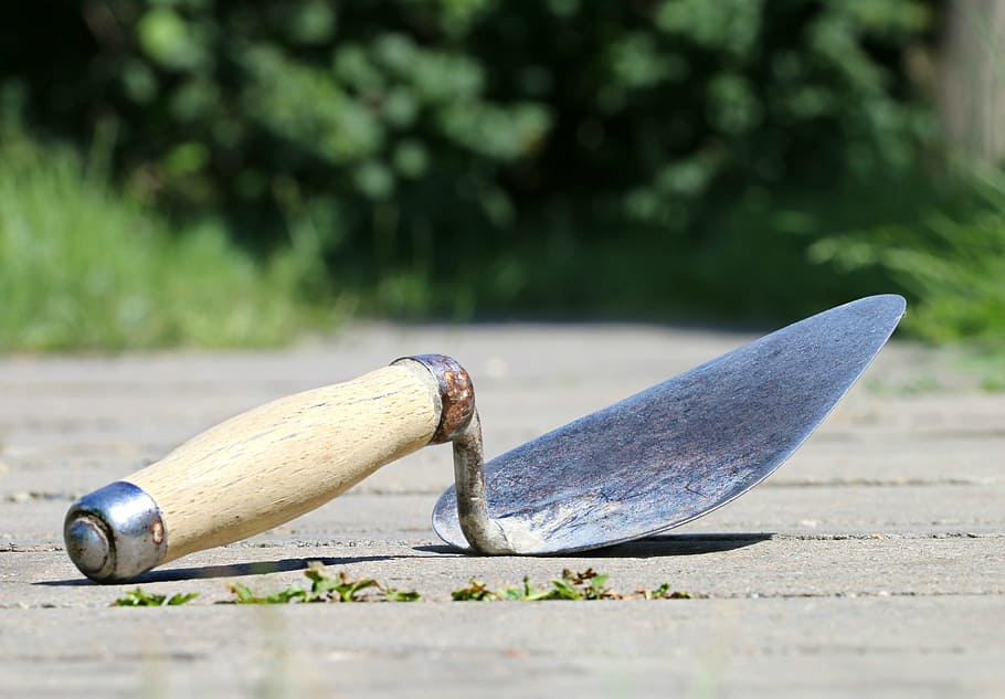 close-up photo of brown wooden hand tool on floor, trowel, spatula HD wallpaper