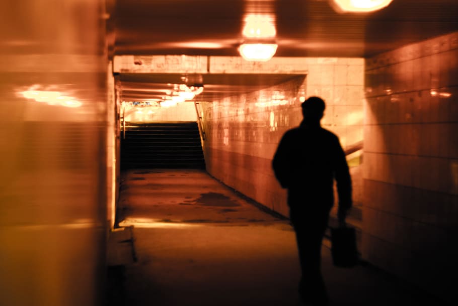 man walking inside building with stair, man walking inside subway HD wallpaper