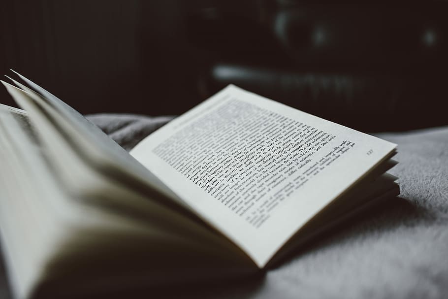 selective focus photography of opened textbook, selective focus photography of book on white textile HD wallpaper