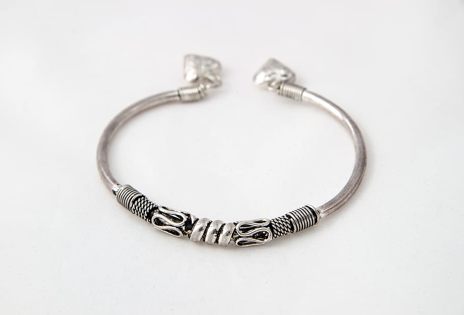silver-colored snake-sculpted bracelet on white surface, Metal HD wallpaper