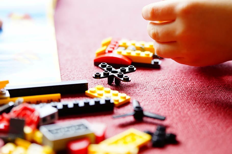 closeup photo of interlocking toy, lego, build, building blocks