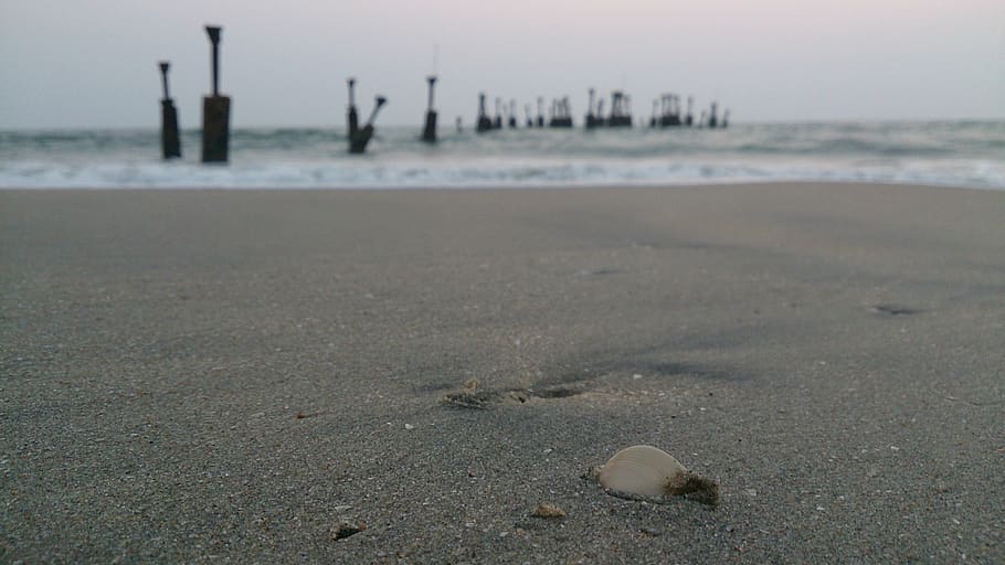 gray sand on seashore at daytime, beach, landscape, travel, ocean