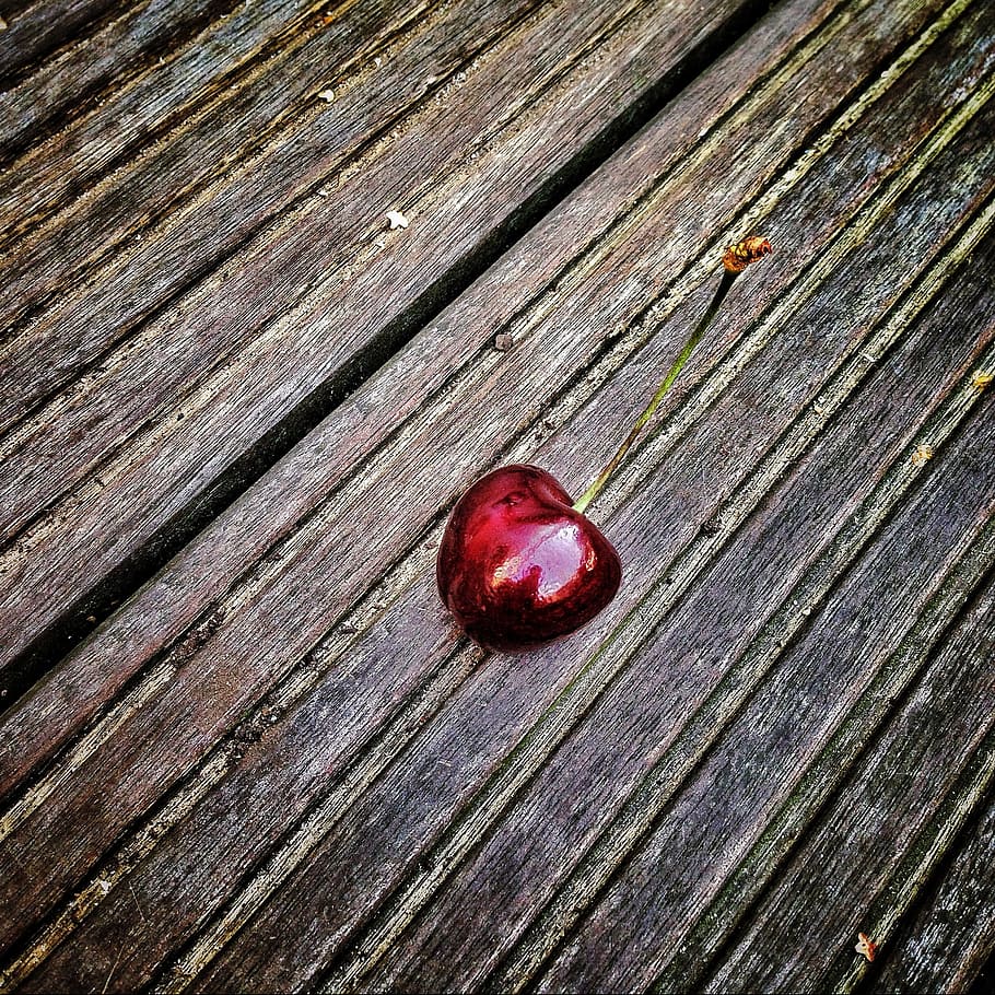 red cherry on black and brown surface, bing, sweet cherry, fruit HD wallpaper