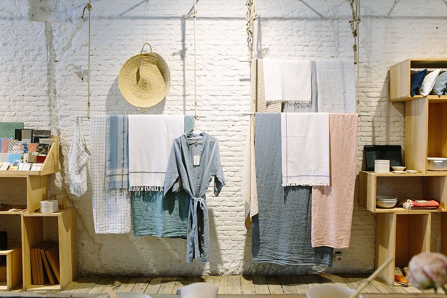 assorted-color towels and scarves hanging on clothes string HD wallpaper