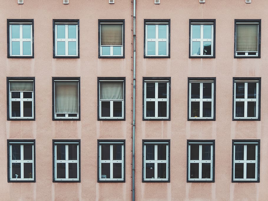 gray concrete building, brown painted establishment with windows HD wallpaper