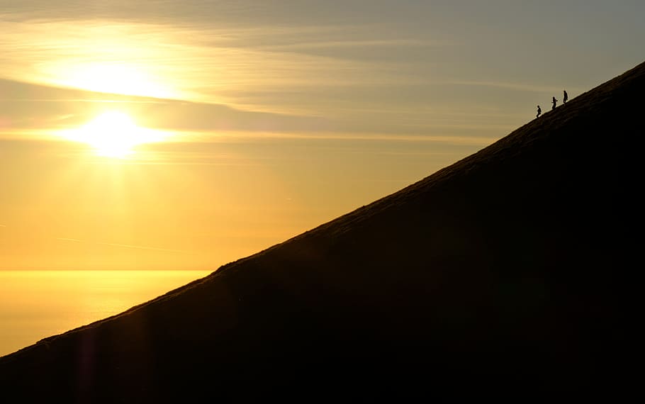sunset, sea, ocean, clouds, sky, mountain, mountaineer, rays HD wallpaper
