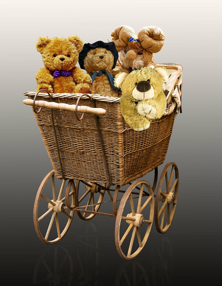 four bear plush toys in brown wicker pram stroller, baby carriage