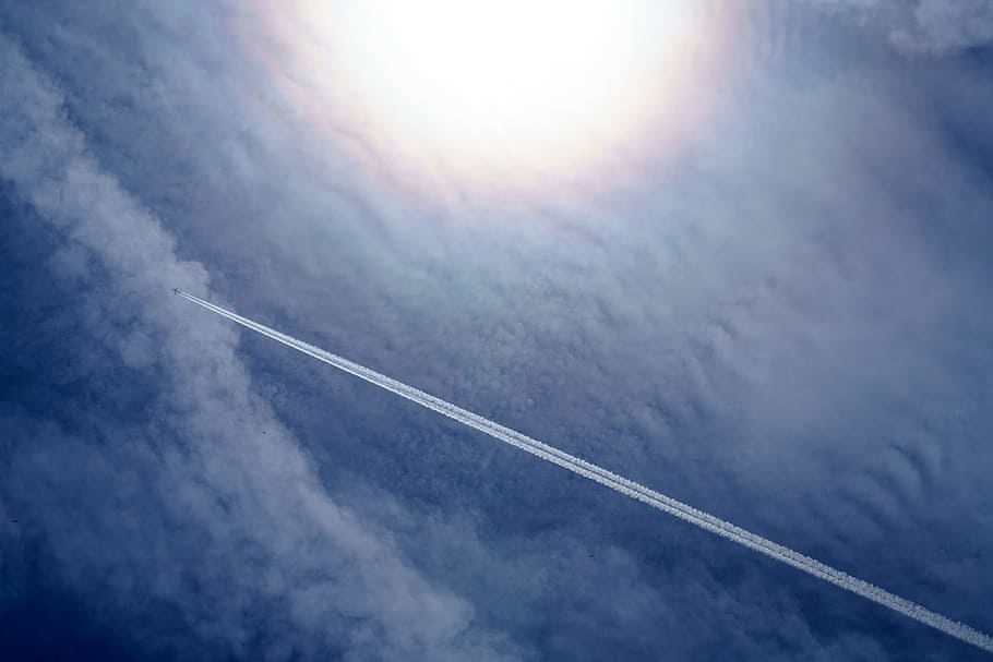 timelapse photography of straight smoke at daytime, jet steam on clouds HD wallpaper