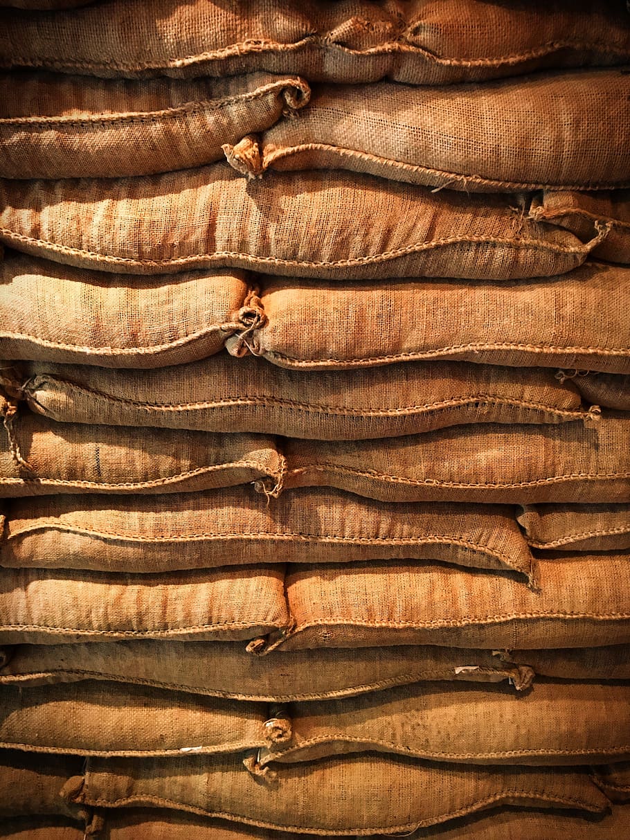 brown pillows, sacks, stacks, stock, texture, warehouse, backgrounds HD wallpaper