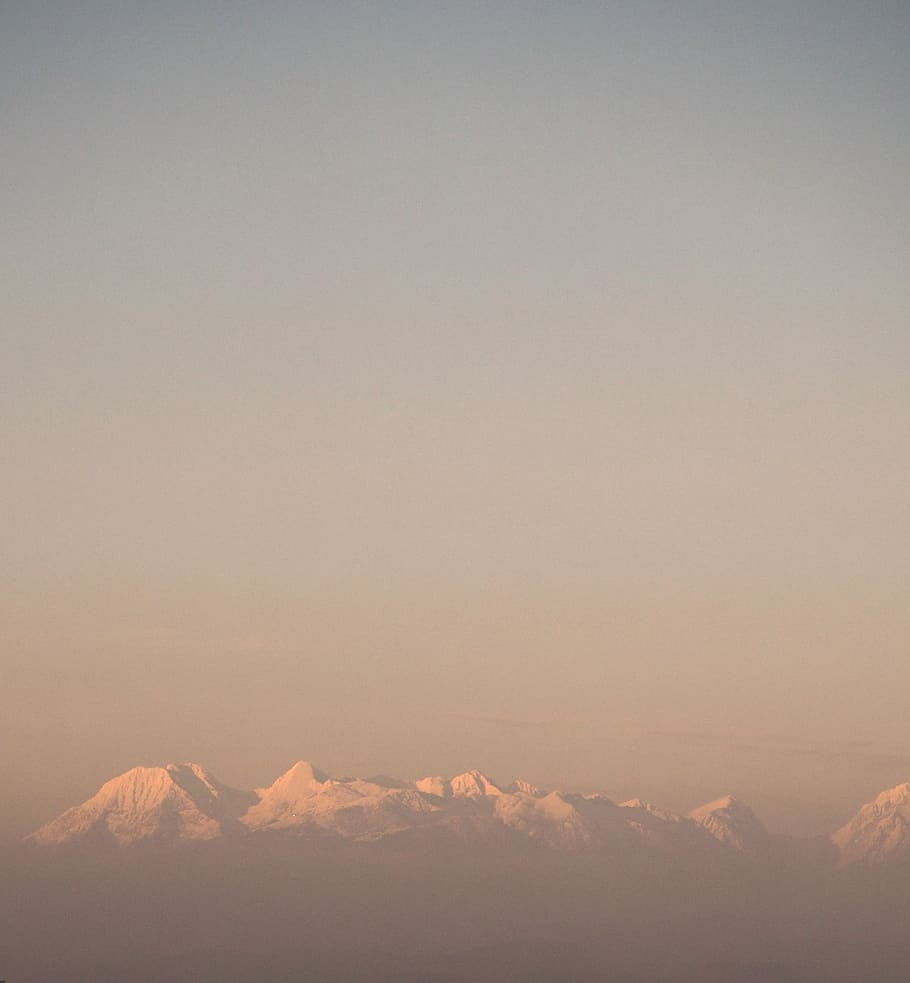 mountain alps under nimbus clouds, snow-covered mountain, mist HD wallpaper