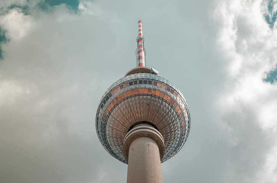 Sore neck, low angle photography of red and gray pointed-edge tower HD wallpaper