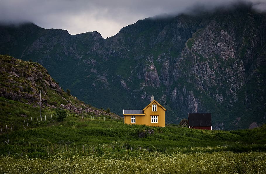 yellow wooden house near mountain during cloudy day, house near mountain HD wallpaper