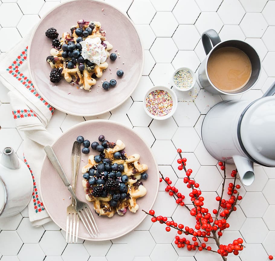 cooked food on white ceramic plates beside white ceramic cup filled with brown liquid near white ceramic teapot and saucers HD wallpaper