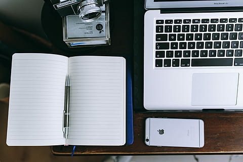 Elegant workspace with Macbook, iPhone, business cards and notebooks HD wallpaper