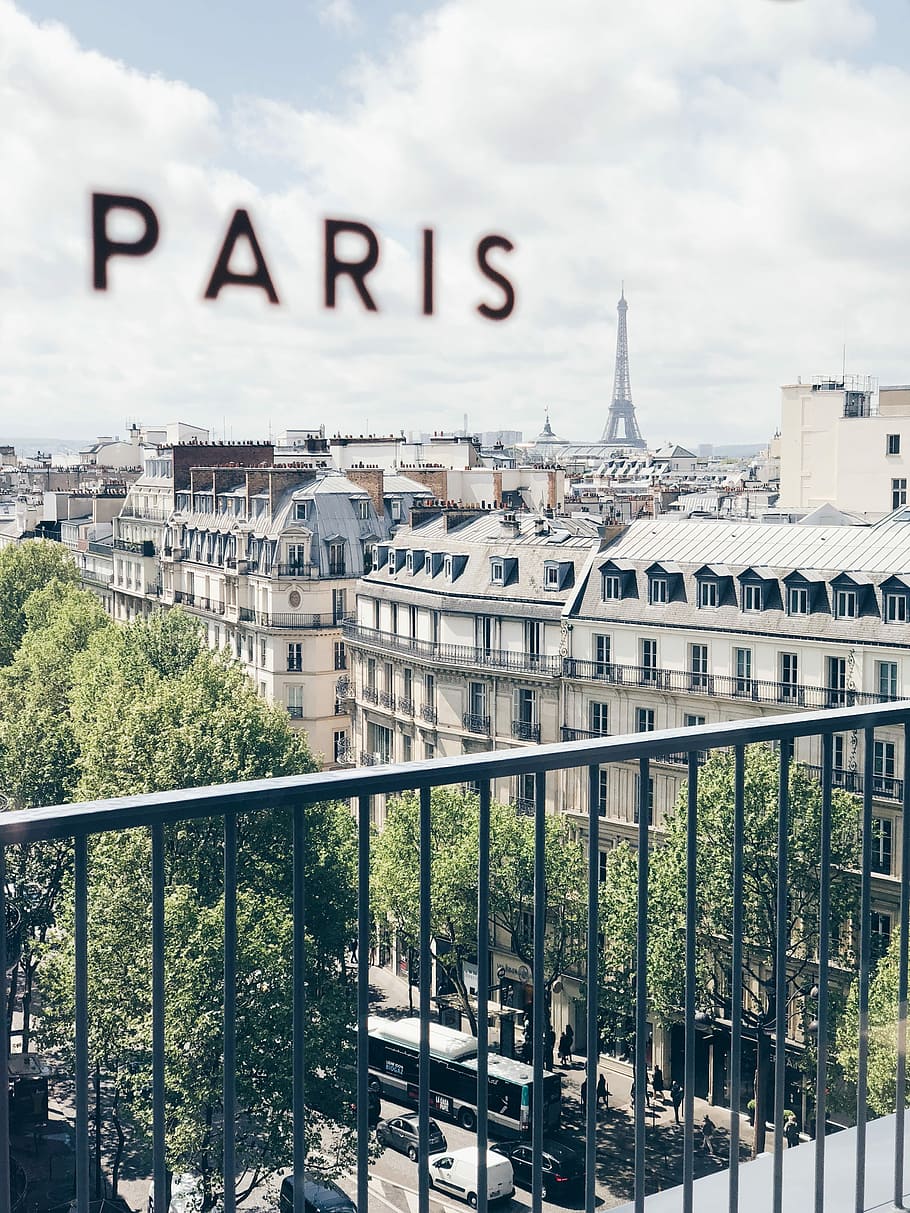 concrete building with balconies during day, Eiffel Tower, Paris HD wallpaper