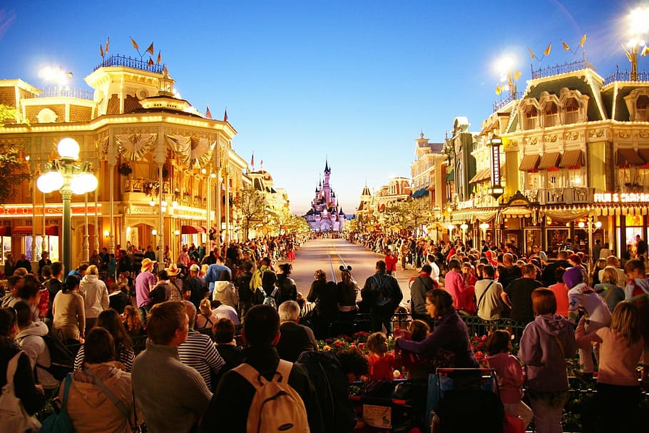 photography of people watching on Cinderellas Castle, euro, disney