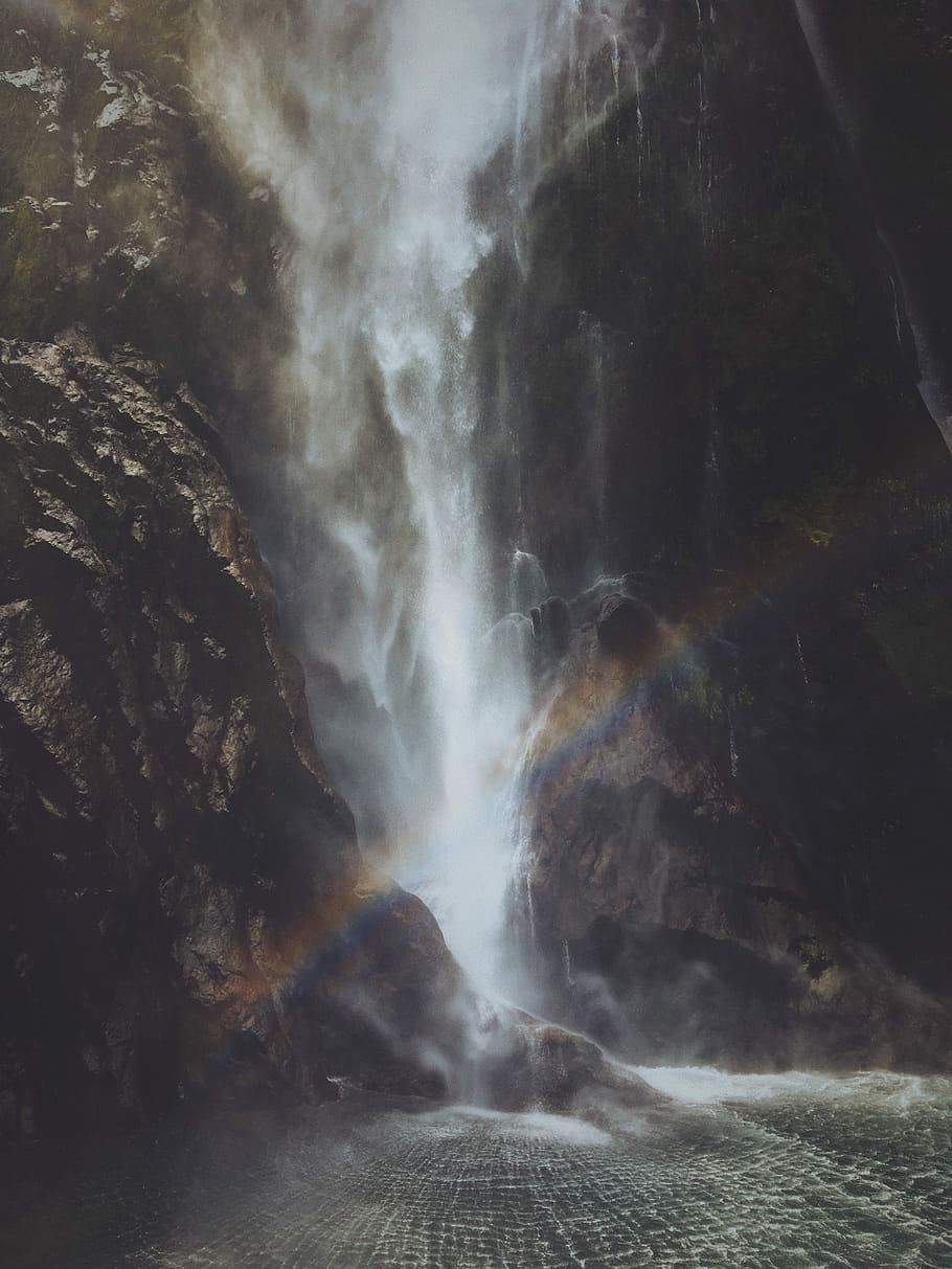 rainbow near the waterfalls, closeup photo of waterfalls, rocks HD wallpaper