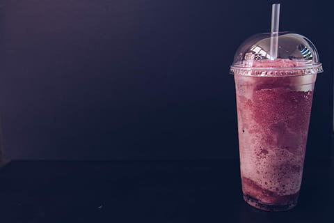 strawberry shake on plastic pack, clear plastic cup filled with pink liquid HD wallpaper